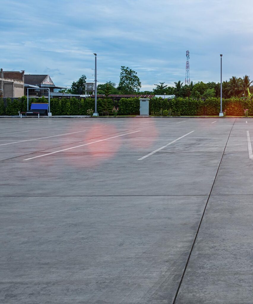 Finished commercial concrete parking lot in Huntington Woods by 4 Way Cement.